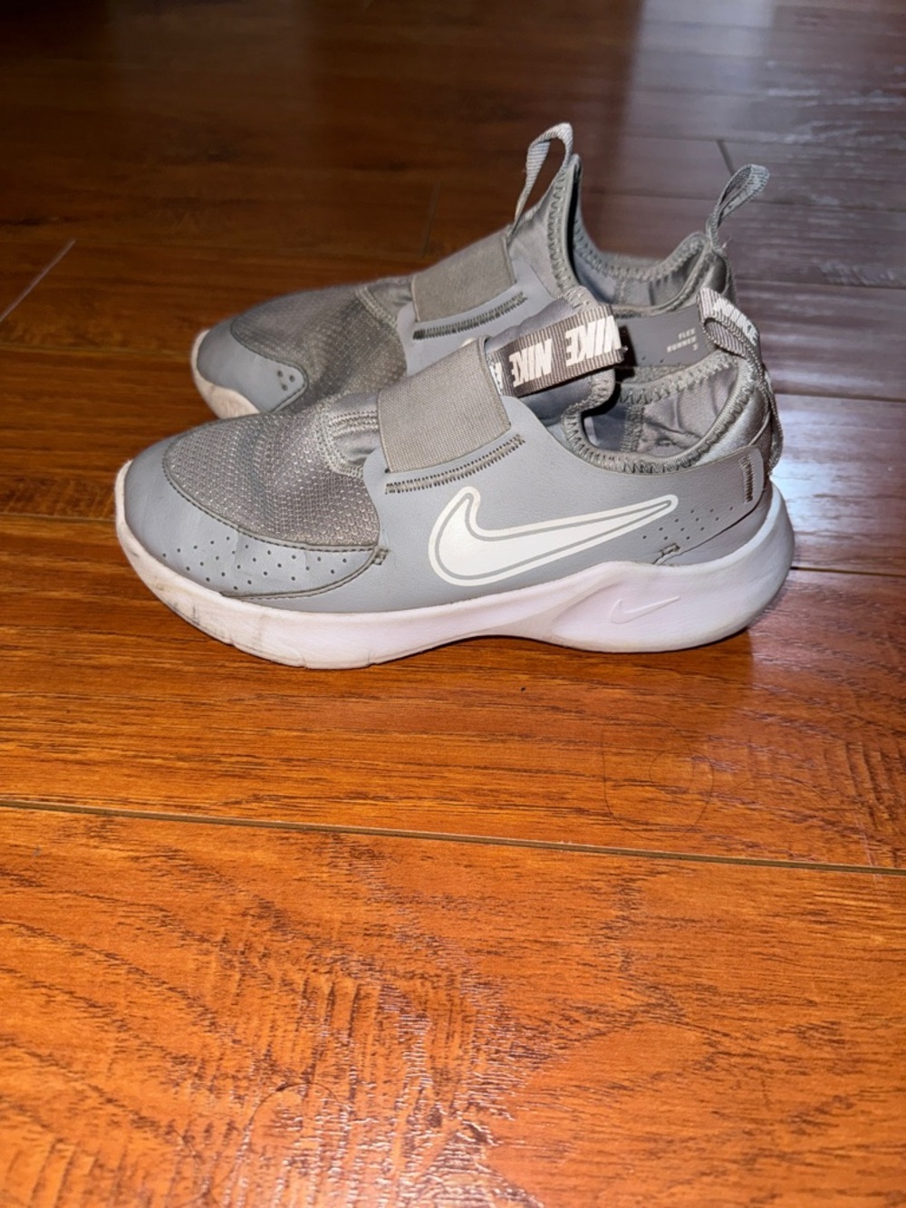 Nike Kids Gray Slip-On Athletic Sneakers with White Swoosh